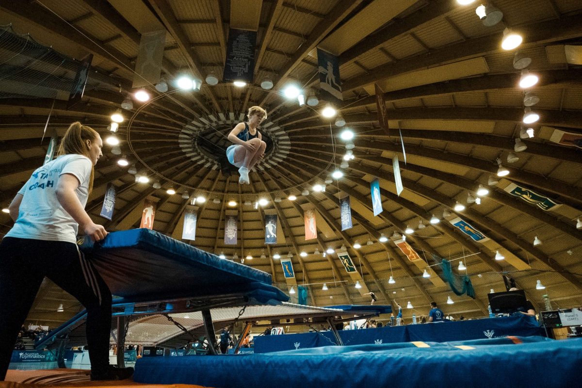 A gymnasts performs a double mini-trampoline pass at the 2019 Scottish National Trampoline & DMT Championships