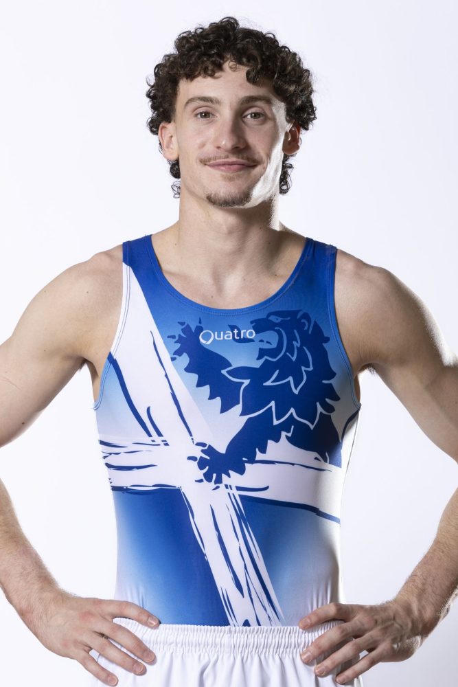 Team Scotland gymnast Reuben Ward wearing Quatro's Glasgow 2026 leotard